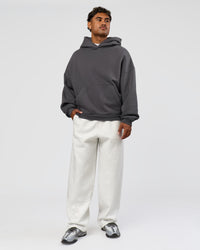 Man wearing Memory In Motion Ultra Heavyweight Washed Hoodie - Dark Storm Washed | Model:Xav | Size:L | Thumbnail Index: 10