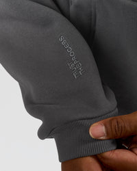 Man wearing Memory In Motion Ultra Heavyweight Washed Hoodie - Dark Storm Washed | Model:Xav | Size:L | Thumbnail Index: 6