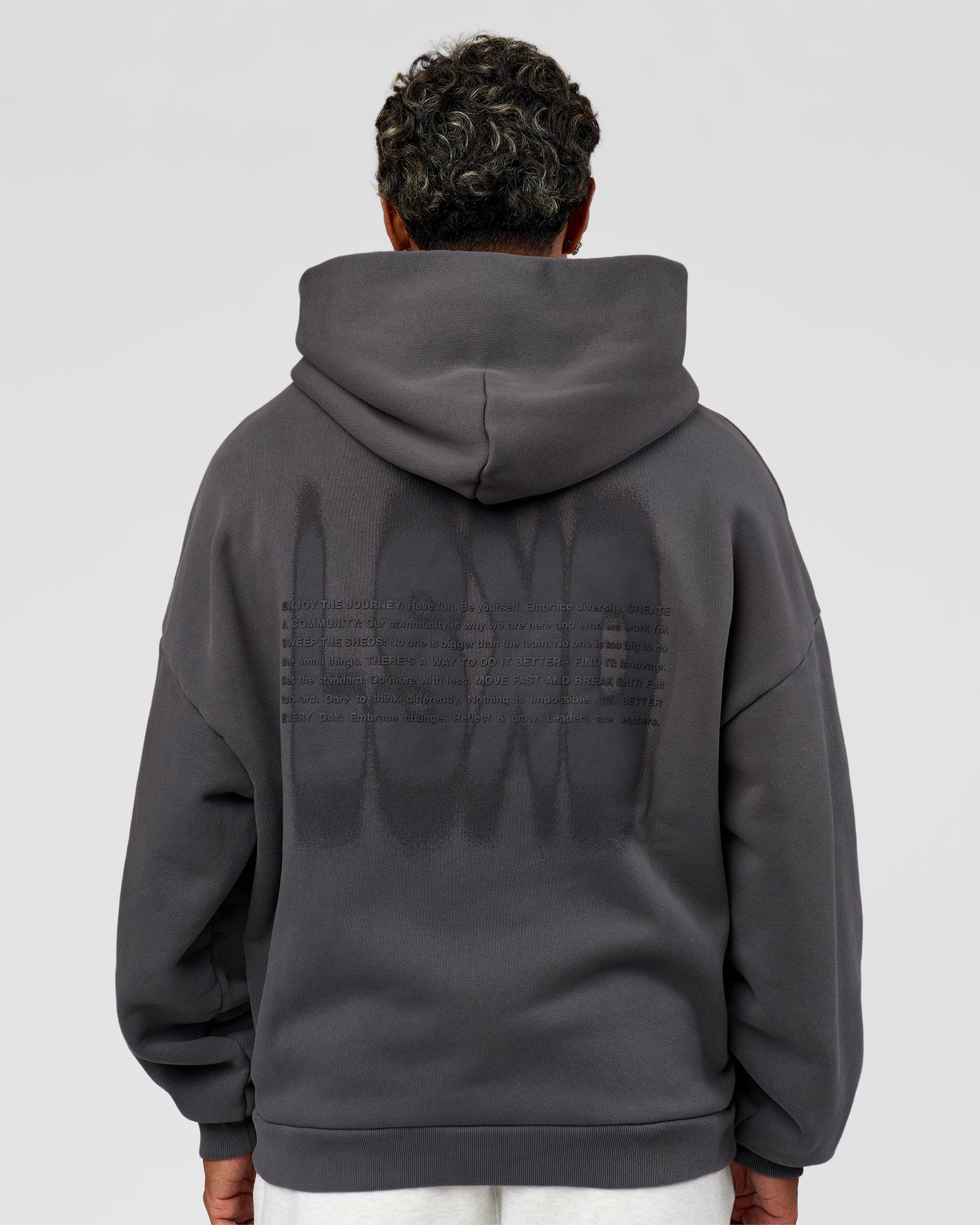 Man wearing Memory In Motion Ultra Heavyweight Washed Hoodie - Dark Storm Washed | Model:Xav | Size:L