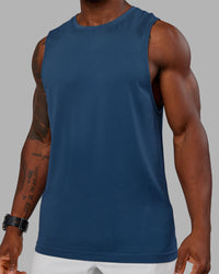 Woman wearing AeroFLX+ Seamless Muscle Tank - Indigo | Model:Sam | Size:L | Thumbnail Index: 4