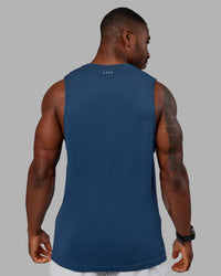 Woman wearing AeroFLX+ Seamless Muscle Tank - Indigo | Model:Sam | Size:L | Thumbnail Index: 2