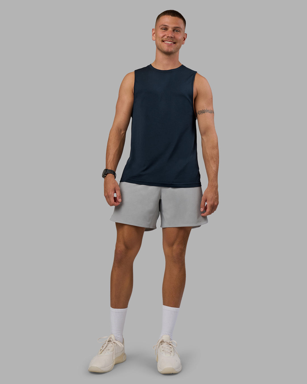 Man wearing AeroFLX+ Seamless Muscle Tank - Navy/Navy | Model:Nikola | Size:L - view 6