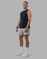 Man wearing AeroFLX+ Seamless Muscle Tank - Navy/Navy | Model:Nikola | Size:L | Thumbnail Index: 0