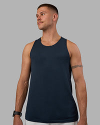 Man wearing AeroFLX+ Seamless Tank - Navy/Navy | Model:Nikola | Size:L | Thumbnail Index: 0