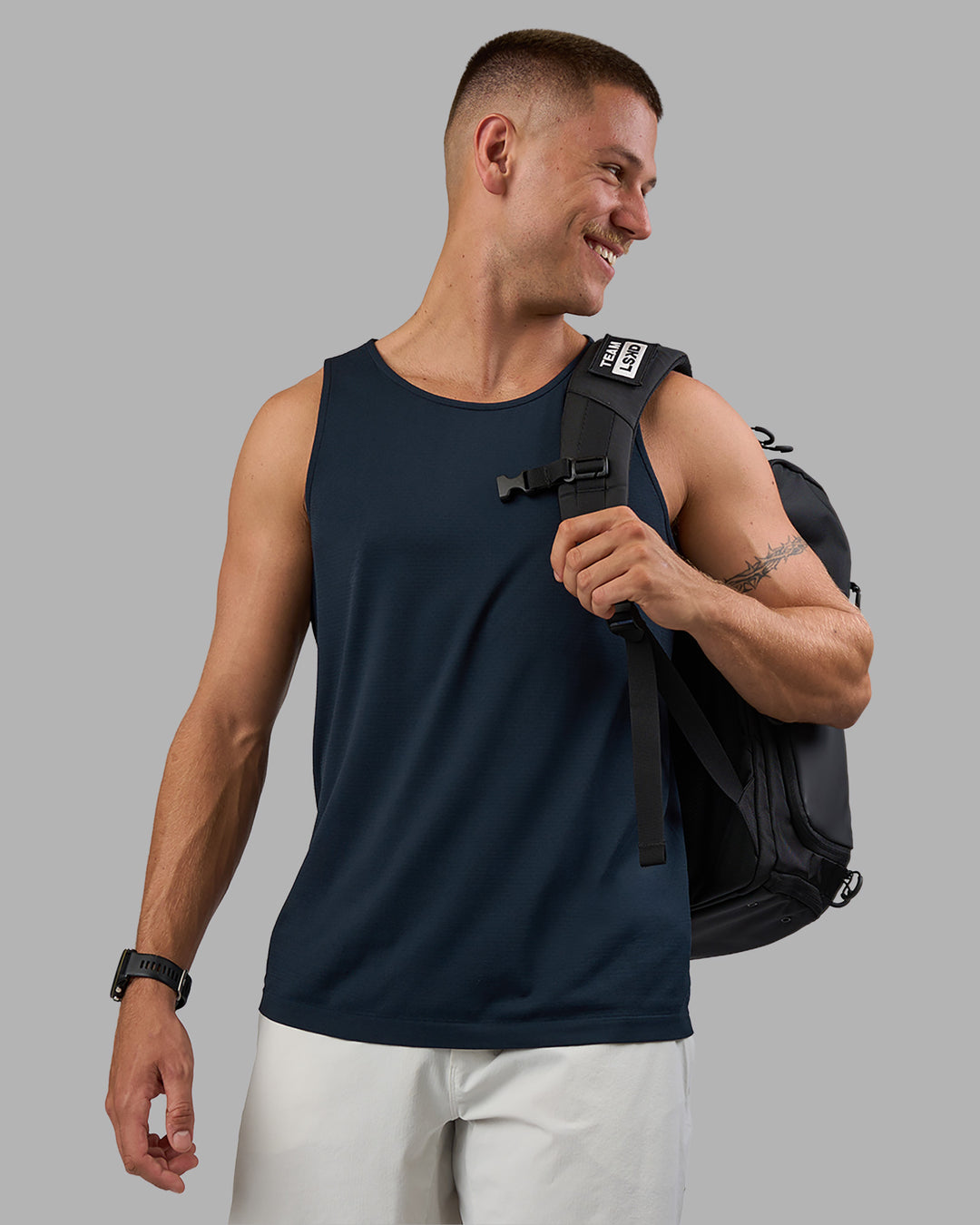 Man wearing AeroFLX+ Seamless Tank - Navy/Navy | Model:Nikola | Size:L - view 6