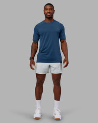 Man wearing AeroFLX+ Seamless Tee - Indigo/Indigo | Model:Sam | Size:L | Thumbnail Index: 4