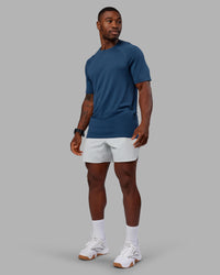Man wearing AeroFLX+ Seamless Tee - Indigo/Indigo | Model:Sam | Size:L | Thumbnail Index: 1