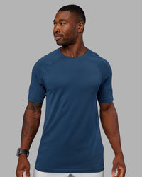 Man wearing AeroFLX+ Seamless Tee - Indigo/Indigo | Model:Sam | Size:L | Thumbnail Index: 0