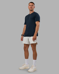 Man wearing AeroFLX+ Seamless Tee - Navy/Navy | Model:Nikola | Size:L | Thumbnail Index: 1