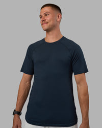 Man wearing AeroFLX+ Seamless Tee - Navy/Navy | Model:Nikola | Size:L | Thumbnail Index: 0