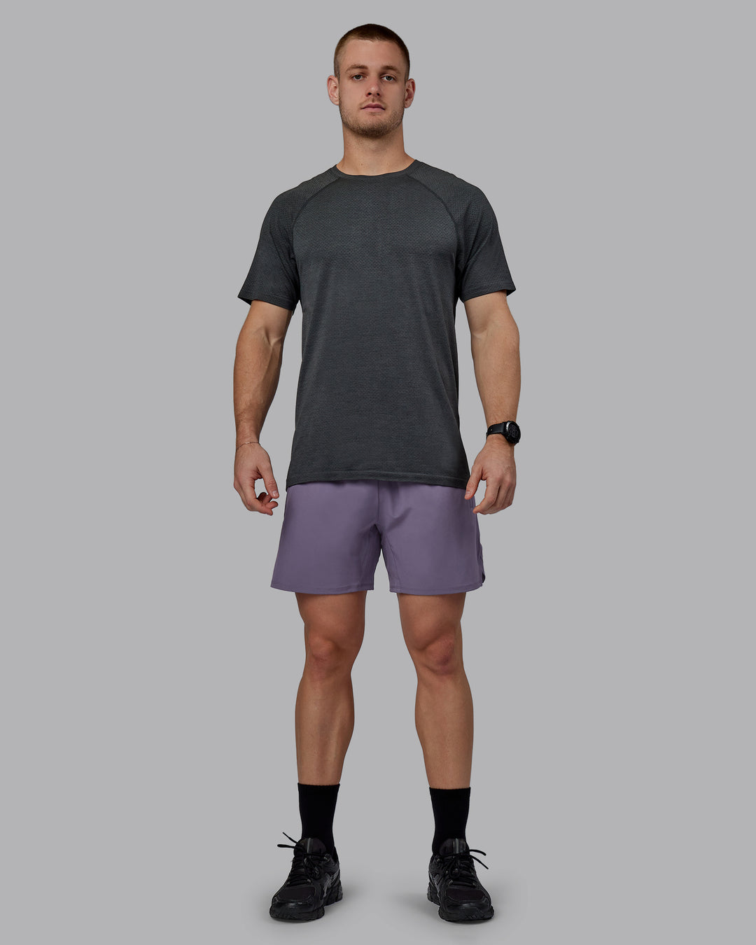Man wearing AeroFLX+ Seamless Tee - Pirate Black Marl - view 6