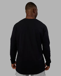 Man wearing Base FLXCotton Long Sleeve Tee - Black | Model:Sam | Size:L | Thumbnail Index: 2