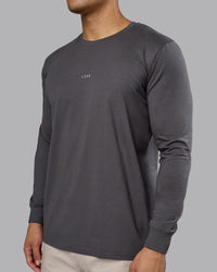 Man wearing Base FLXCotton Long Sleeve Tee - Dark Storm | Model:Kaelyb | Size:L | Thumbnail Index: 4