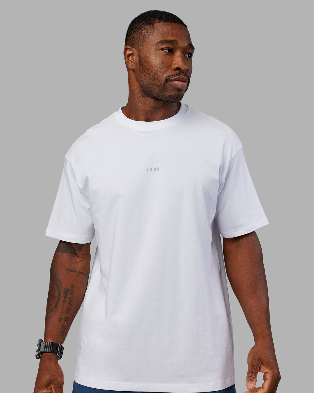 Man wearing Base FLXCotton Tee Oversized - White | Model:Sam | Size:L - view 5