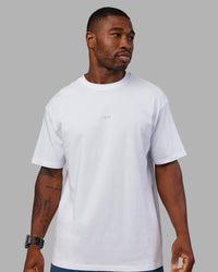 Man wearing Base FLXCotton Tee Oversized - White | Model:Sam | Size:L | Thumbnail Index: 4