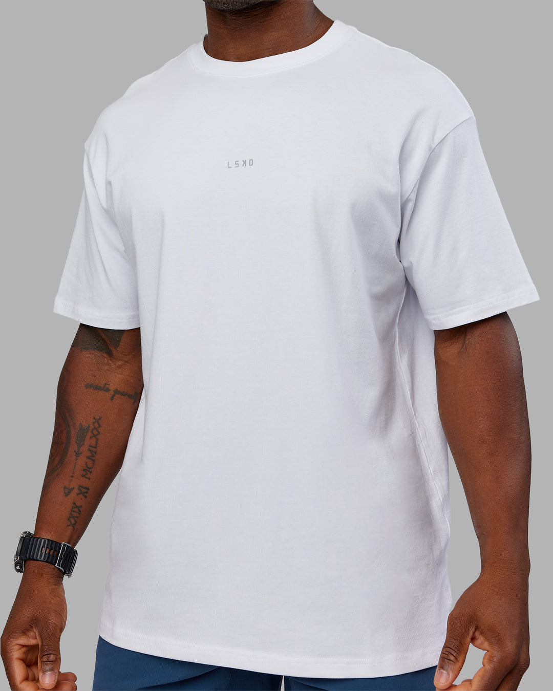 Man wearing Base FLXCotton Tee Oversized - White | Model:Sam | Size:L - view 7