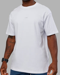 Man wearing Base FLXCotton Tee Oversized - White | Model:Sam | Size:L | Thumbnail Index: 6