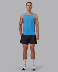 Man wearing Cadence Tank - Azure Blue | Thumbnail Index: 4