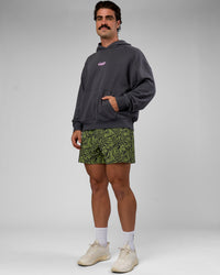 Man wearing Miami Vibe Oversized Hoodie - Dark Storm-Marshmallow | Model:Adam | Size:L | Thumbnail Index: 6
