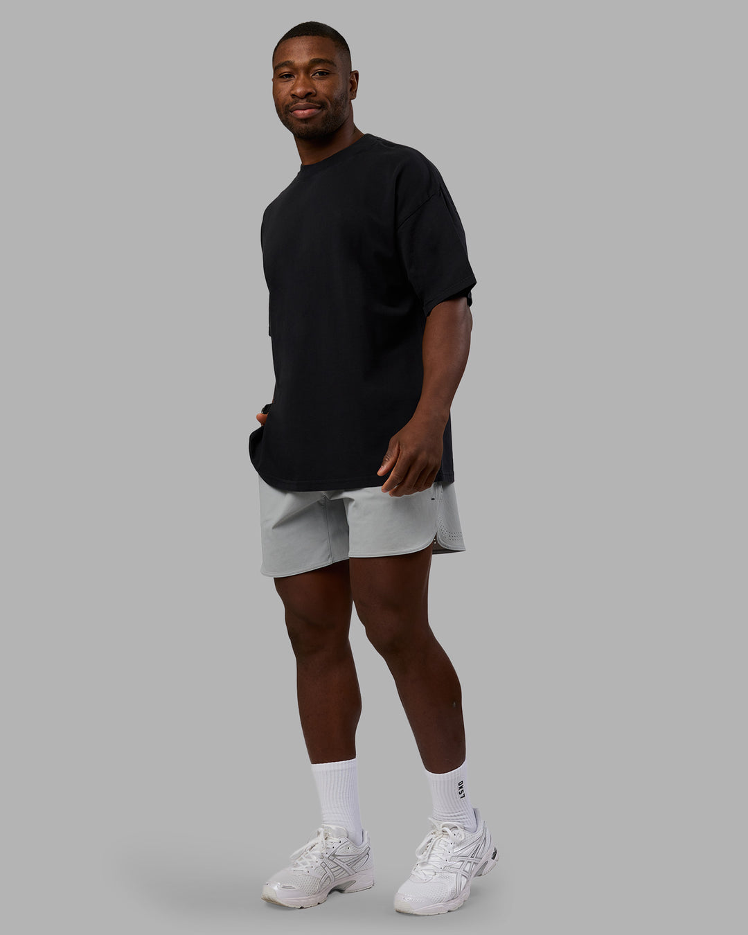 Man wearing Move Fast Washed Heavyweight Tee Oversize - Black-Island Paradise | Model:Sam | Size:L - view 4