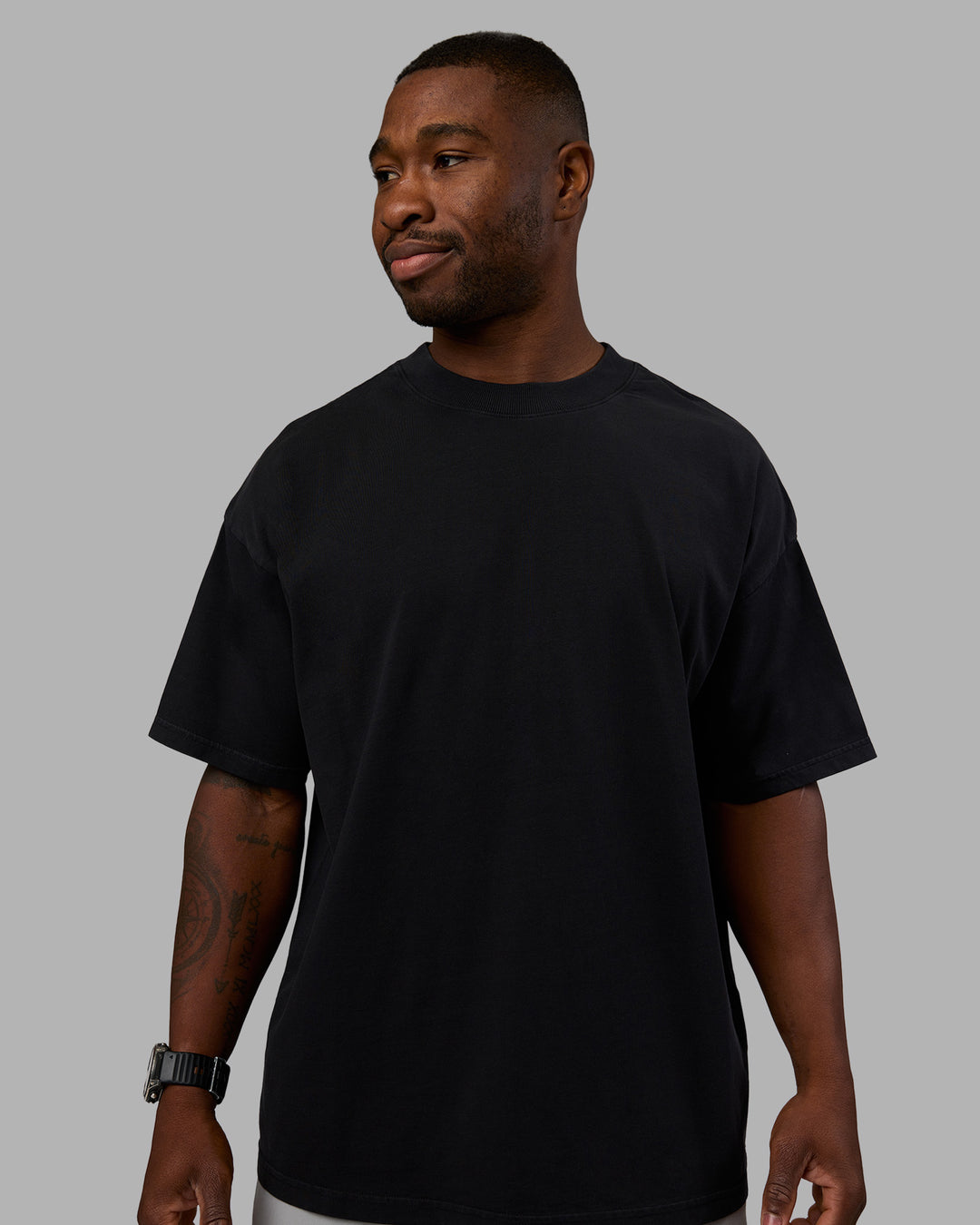 Man wearing Move Fast Washed Heavyweight Tee Oversize - Black-Island Paradise | Model:Sam | Size:L - view 3
