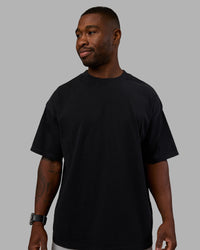 Man wearing Move Fast Washed Heavyweight Tee Oversize - Black-Island Paradise | Model:Sam | Size:L | Thumbnail Index: 2
