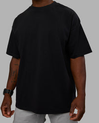 Man wearing Move Fast Washed Heavyweight Tee Oversize - Black-Island Paradise | Model:Sam | Size:L | Thumbnail Index: 9