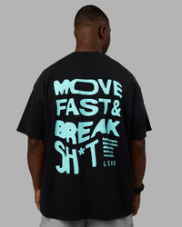 Man wearing Move Fast Washed Heavyweight Tee Oversize - Black-Island Paradise | Model:Sam | Size:L | Thumbnail Index: 5