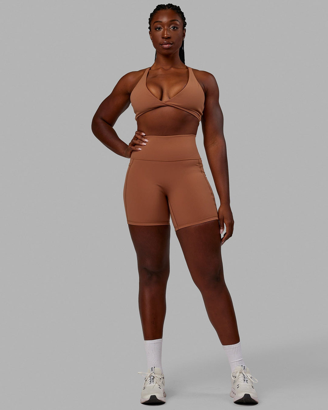 Woman wearing Nimble Sports Bra - Brick - view 5