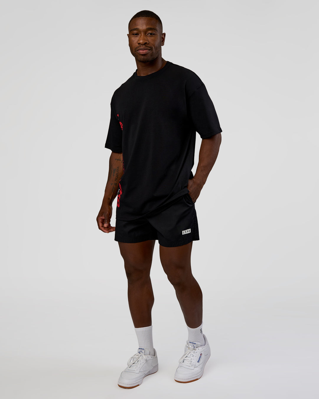 Man wearing Nothing Is Impossible FLXCotton Oversized Tee - Black-Flame | Model:Sam | Size:L - view 6