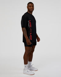 Man wearing Nothing Is Impossible FLXCotton Oversized Tee - Black-Flame | Model:Sam | Size:L | Thumbnail Index: 9