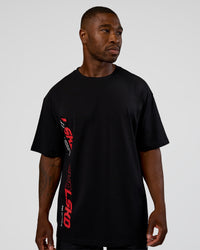 Man wearing Nothing Is Impossible FLXCotton Oversized Tee - Black-Flame | Model:Sam | Size:L | Thumbnail Index: 1