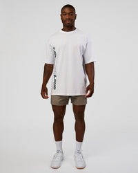 Man wearing Nothing Is Impossible FLXCotton Oversized Tee - White-Vital Green | Model:Sam | Size:L | Thumbnail Index: 2