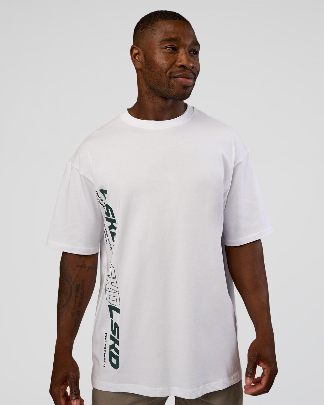 Man wearing Nothing Is Impossible FLXCotton Oversized Tee - White-Vital Green | Model:Sam | Size:L - view 12