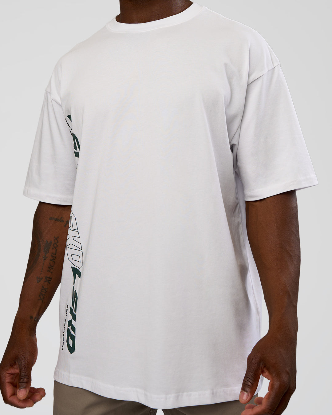 Man wearing Nothing Is Impossible FLXCotton Oversized Tee - White-Vital Green | Model:Sam | Size:L - view 7