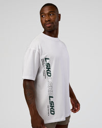 Man wearing Nothing Is Impossible FLXCotton Oversized Tee - White-Vital Green | Model:Sam | Size:L | Thumbnail Index: 1