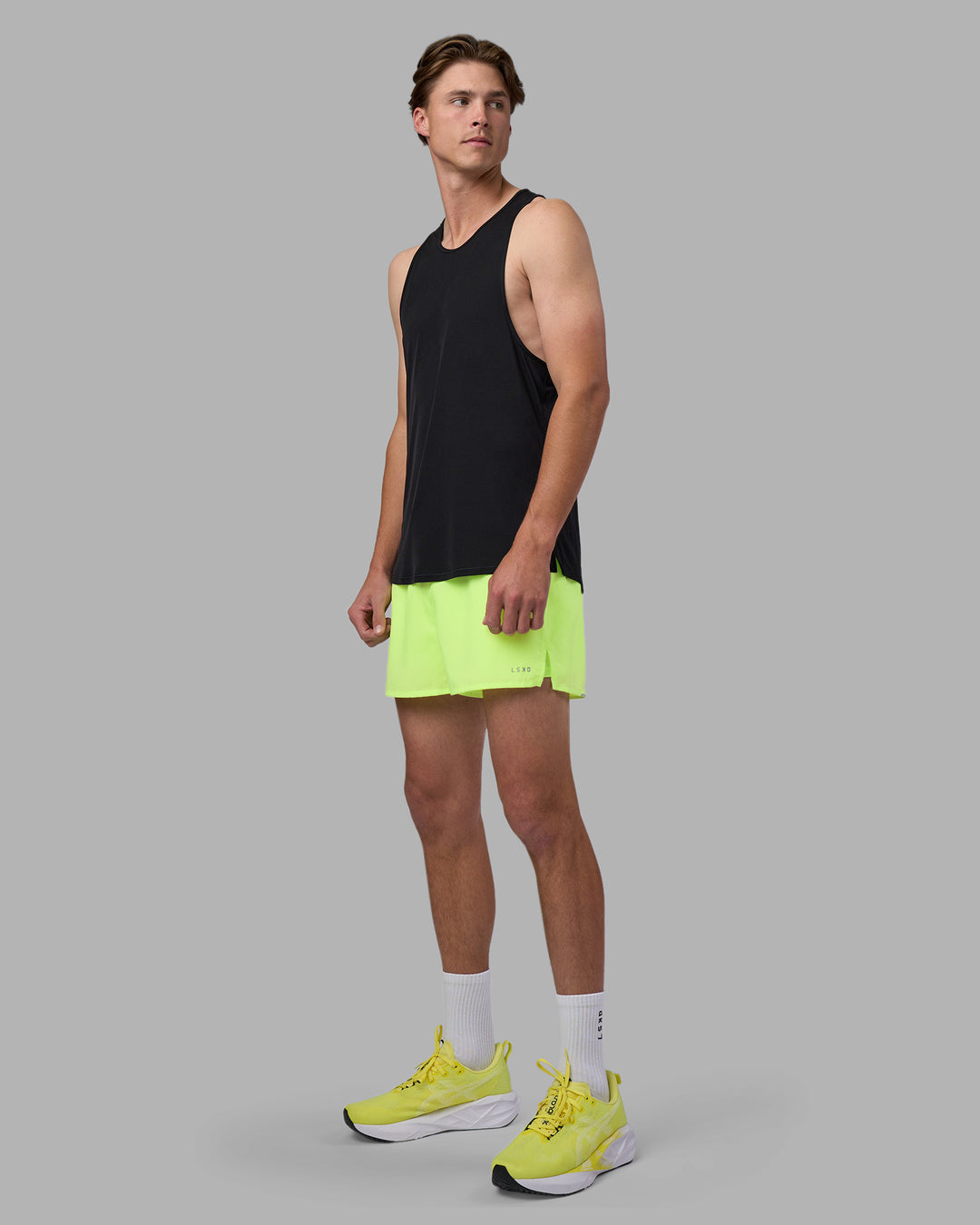 Man wearing Pace 3" Performance Short - Lime Glo | Model:Brandon | Size:L - view 10