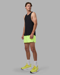 Man wearing Pace 3" Performance Short - Lime Glo | Model:Brandon | Size:L | Thumbnail Index: 9