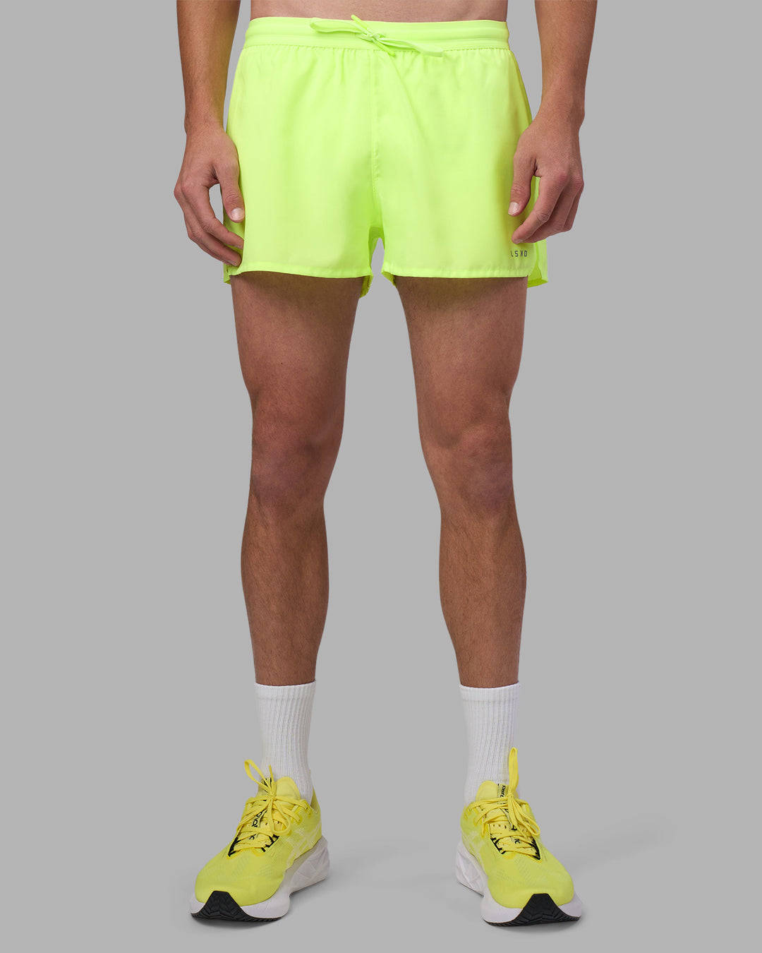 Man wearing Pace 3" Performance Short - Lime Glo | Model:Brandon | Size:L - view 6