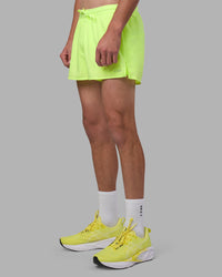 Man wearing Pace 3" Performance Short - Lime Glo | Model:Brandon | Size:L | Thumbnail Index: 13