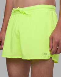 Man wearing Pace 3" Performance Short - Lime Glo | Model:Brandon | Size:L | Thumbnail Index: 6