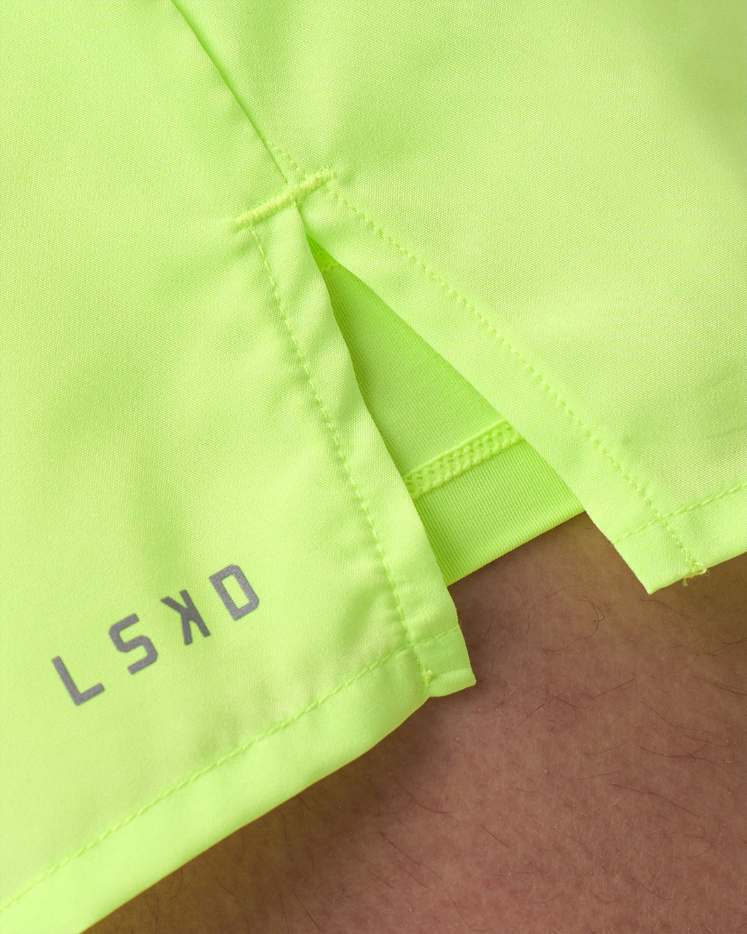 Man wearing Pace 3" Performance Short - Lime Glo | Model:Brandon | Size:L - view 8