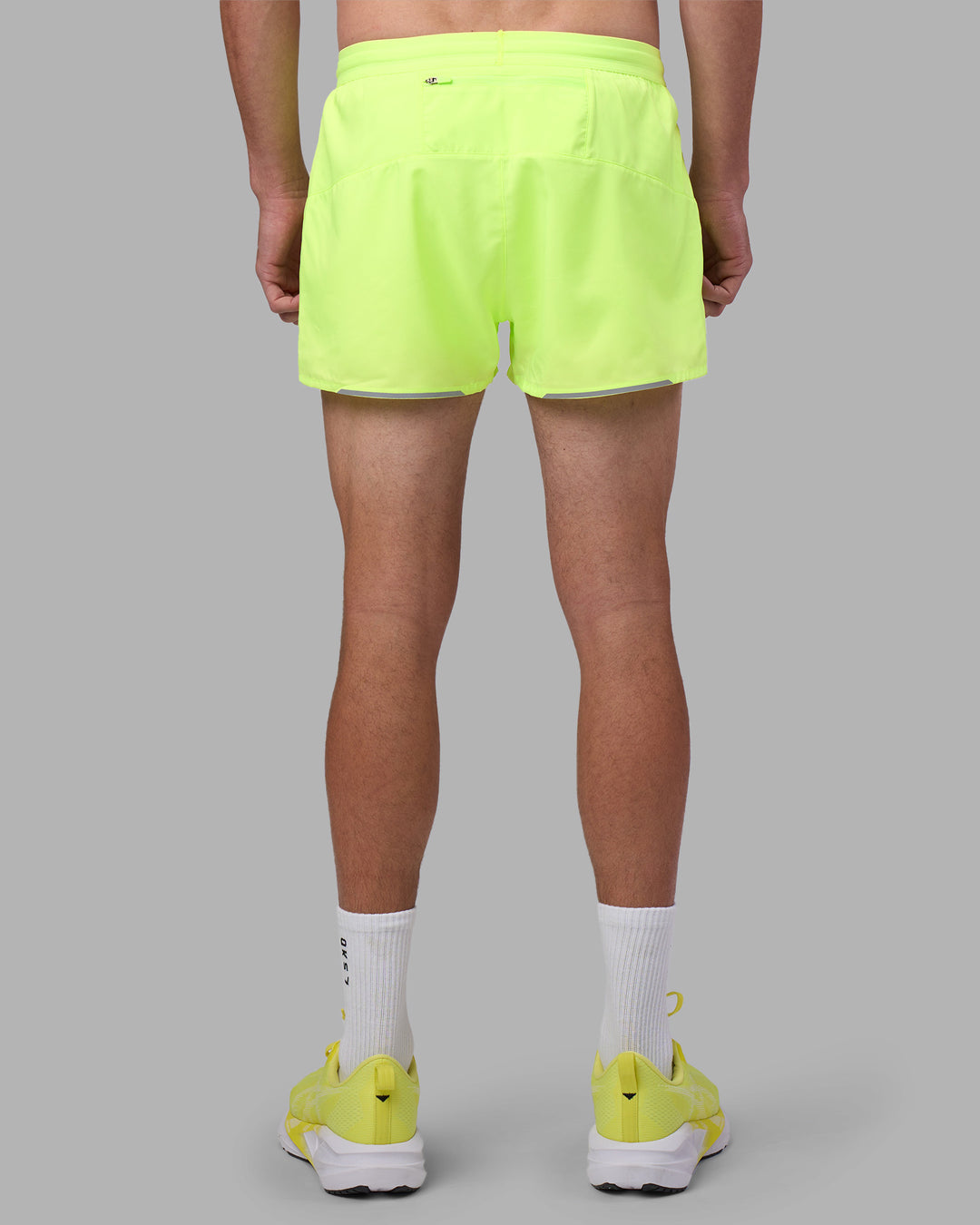 Man wearing Pace 3" Performance Short - Lime Glo | Model:Brandon | Size:L - view 11