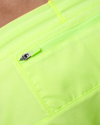 Man wearing Pace 3" Performance Short - Lime Glo | Model:Brandon | Size:L | Thumbnail Index: 11