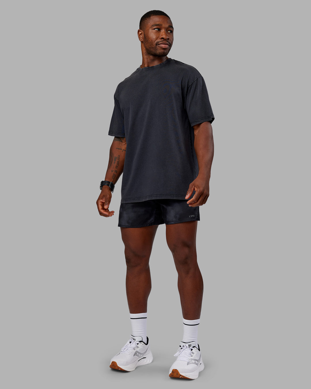 Man wearing Pace 5" Lined Performance Short - Washed Black | Model:Sam | Size:L - view 3