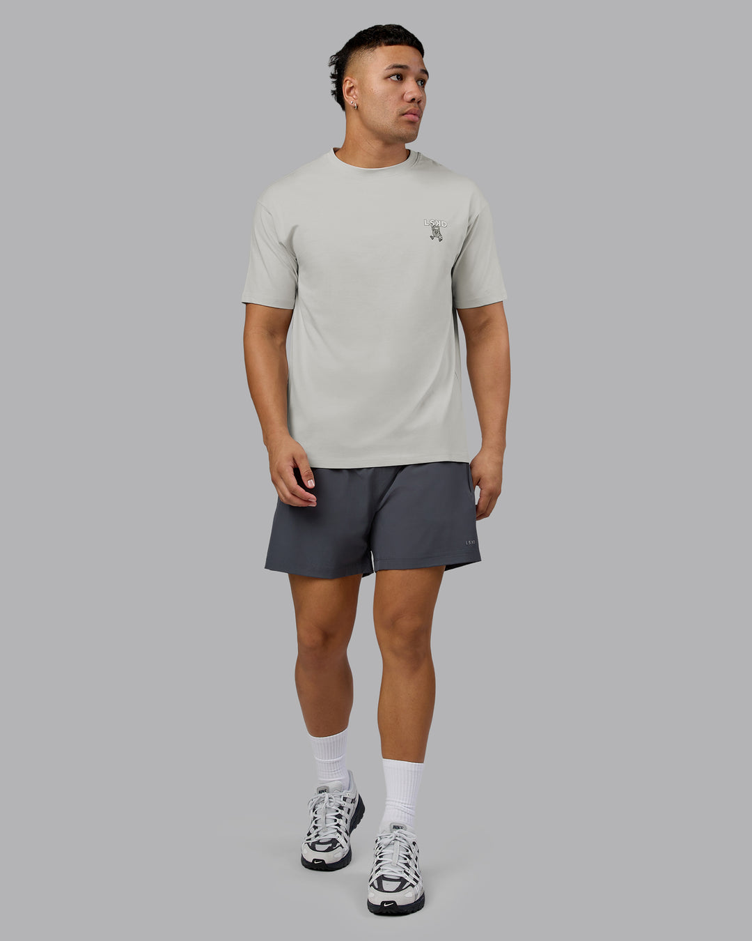 Man wearing Perspective FLXCotton Oversized Tee - Digital Mist-White | Model:Kaelyb | Size:L - view 6