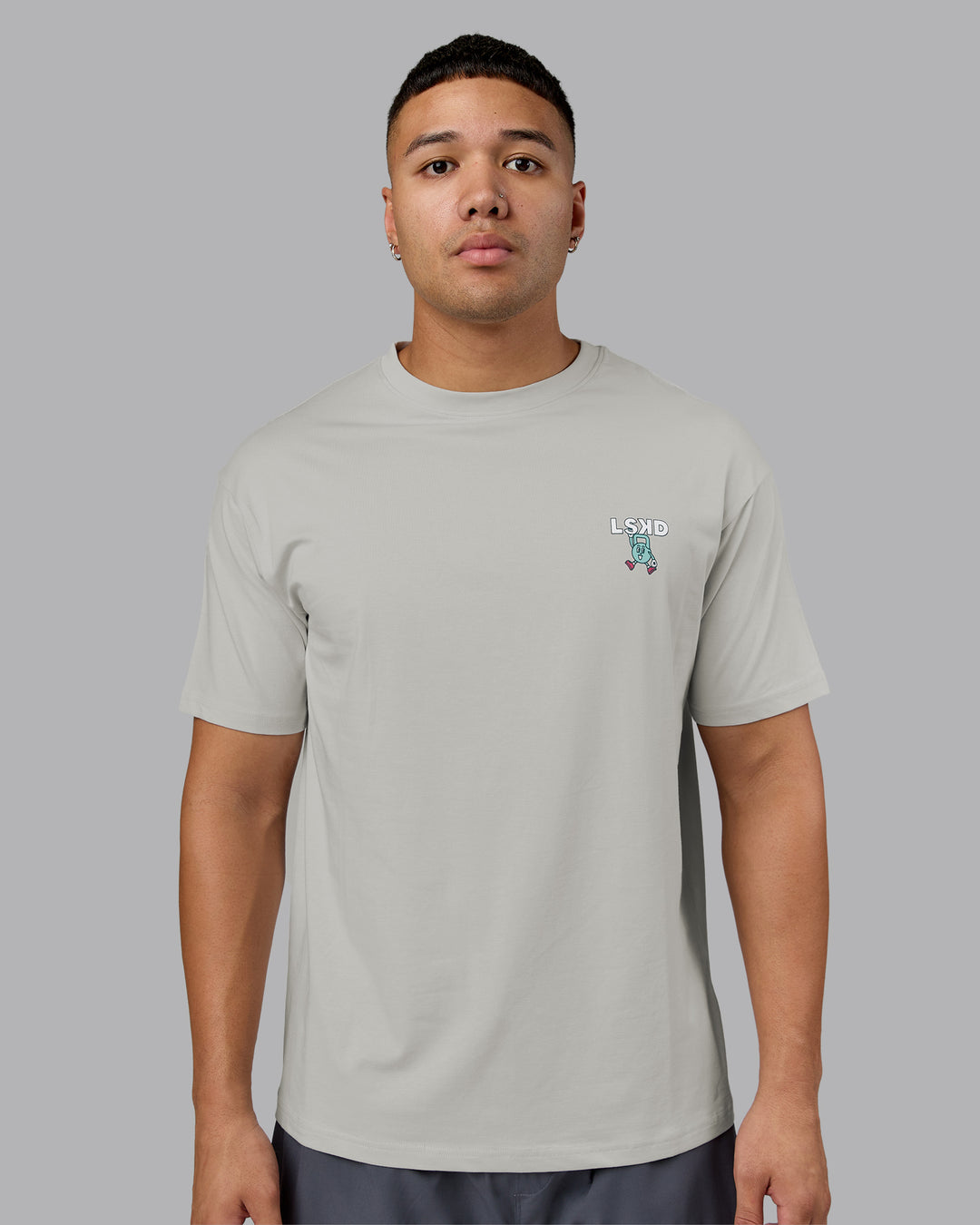 Man wearing Perspective FLXCotton Oversized Tee - Digital Mist-White | Model:Kaelyb | Size:L - view 4
