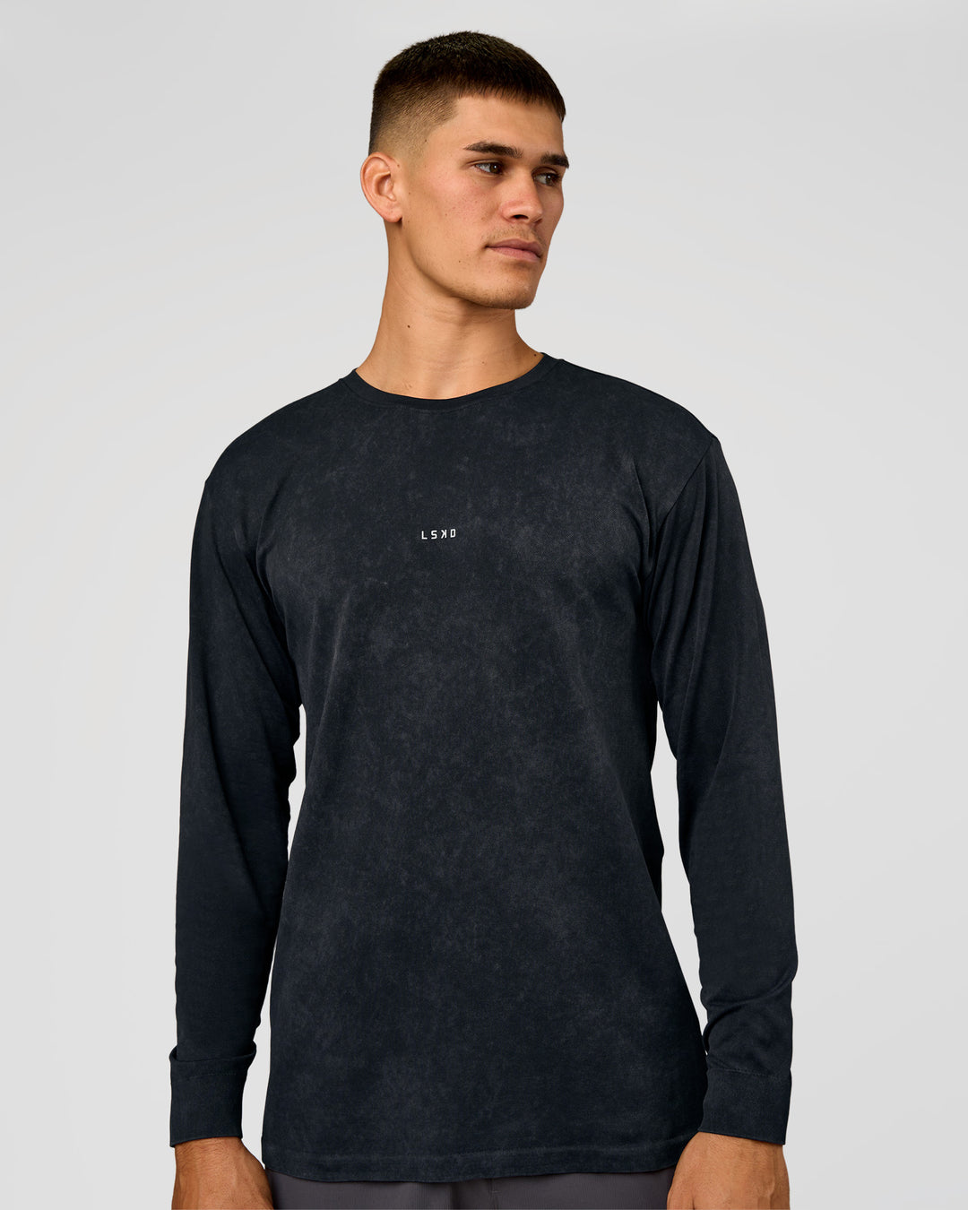 Man wearing Power Oversized Long Sleeve Tee - Black Washed | Model:Jackson | Size:L - view 1