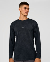 Man wearing Power Oversized Long Sleeve Tee - Black Washed | Model:Jackson | Size:L | Thumbnail Index: 0