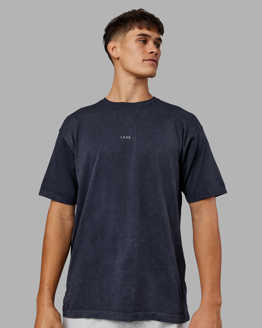 Man wearing Power Oversized Tee - Pirate Black Washed |Model:Jackson | Size:L - view 1